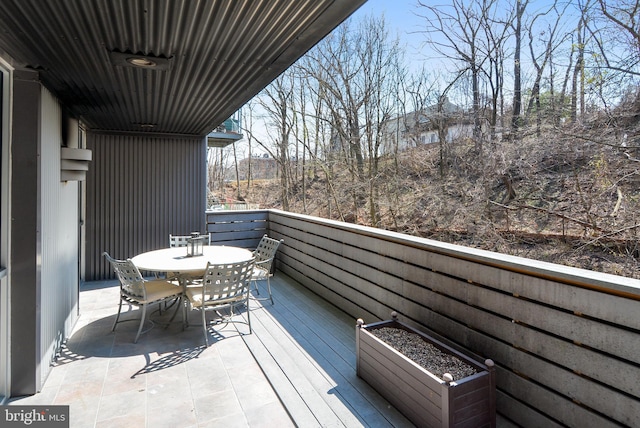 balcony with outdoor dining area