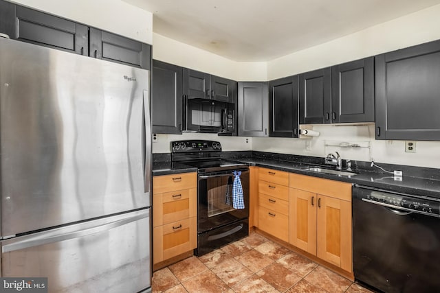 kitchen with black appliances, dark cabinets, and a sink