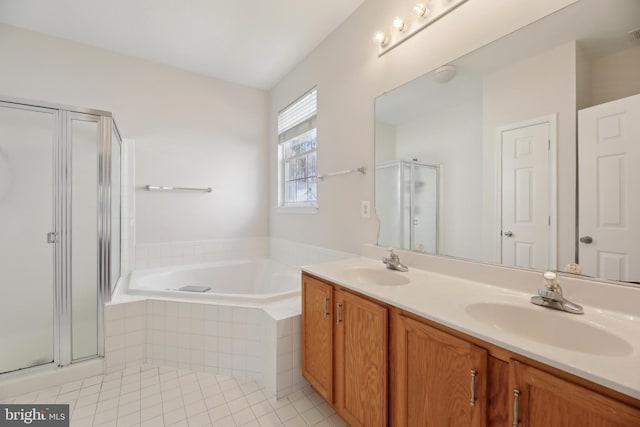 full bath featuring a shower stall, a sink, a bath, and tile patterned floors