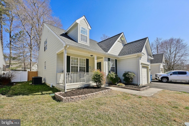 cape cod-style house with a porch, cooling unit, a garage, fence, and driveway