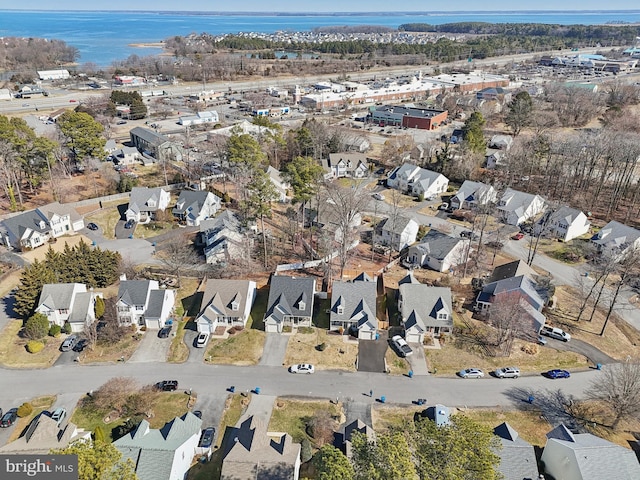 birds eye view of property with a residential view