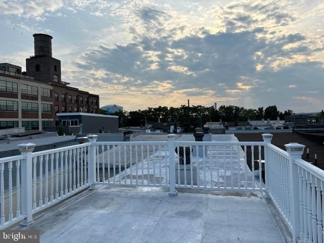 view of patio terrace at dusk