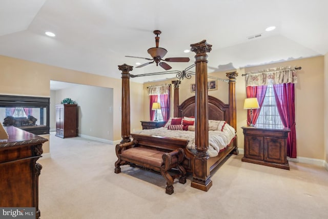 bedroom with light colored carpet, visible vents, baseboards, and recessed lighting