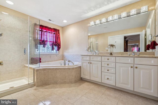 full bath featuring double vanity, a stall shower, visible vents, tile patterned flooring, and a bath