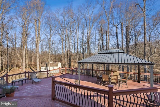 wooden terrace with a gazebo