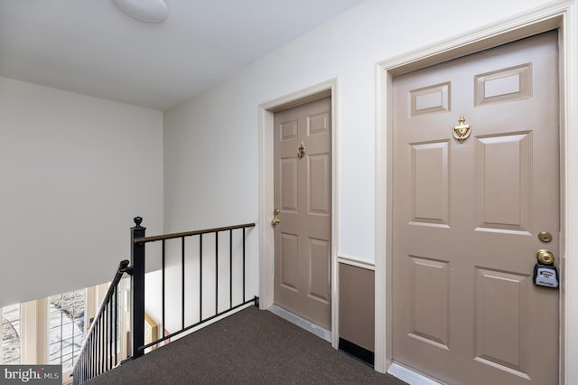 entrance to property featuring a balcony