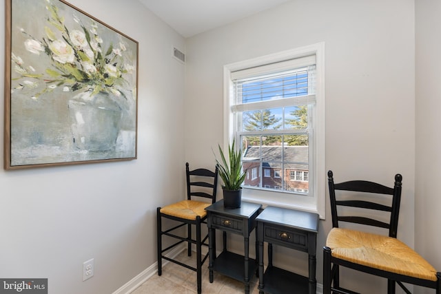 home office featuring visible vents and baseboards