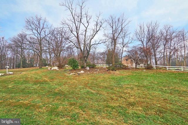 view of yard featuring fence