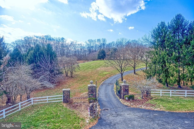 birds eye view of property with a rural view