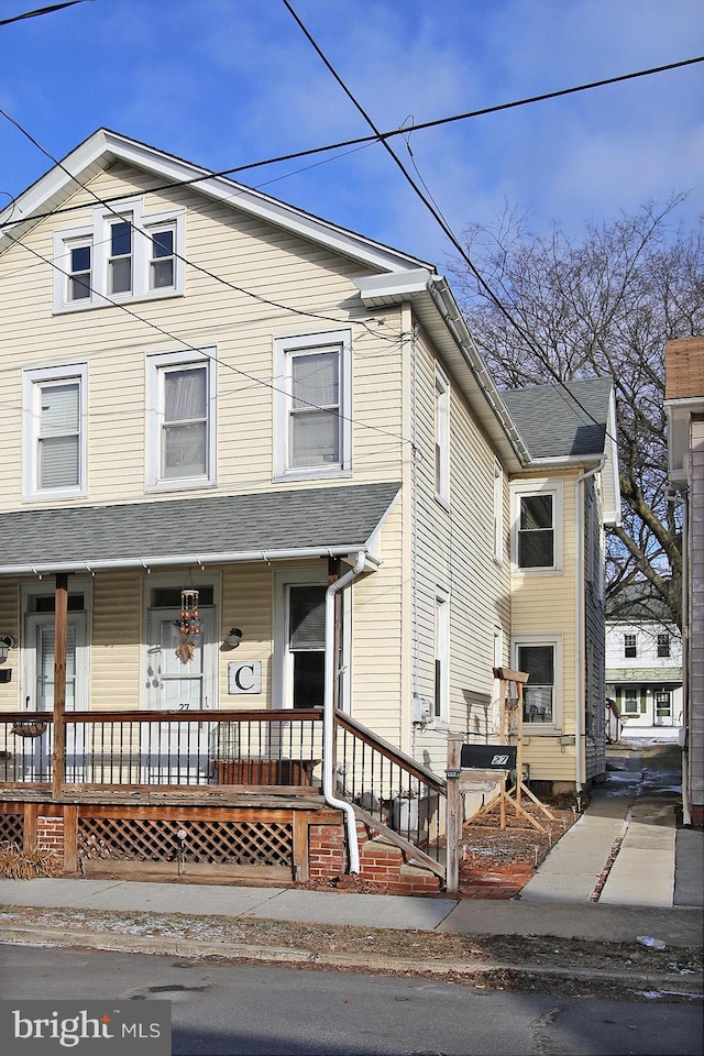 view of property with covered porch