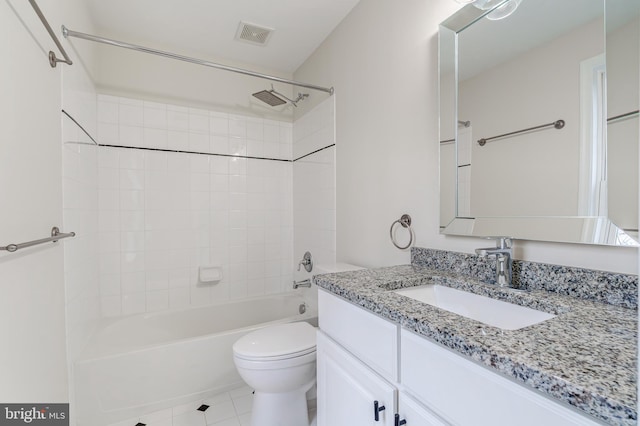 bathroom featuring visible vents, toilet, tile patterned flooring, vanity, and shower / bathing tub combination