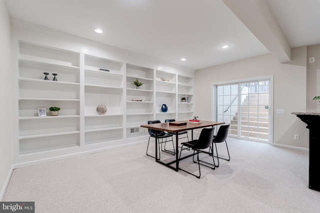 carpeted dining area with visible vents, recessed lighting, beam ceiling, and baseboards