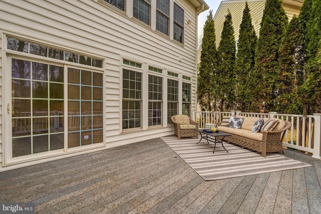 wooden deck featuring outdoor lounge area