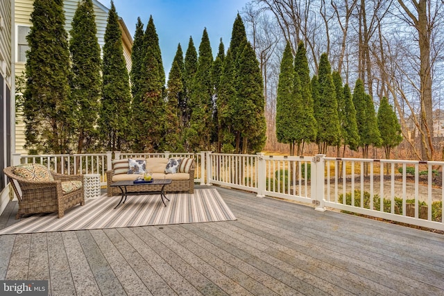 wooden deck featuring an outdoor hangout area