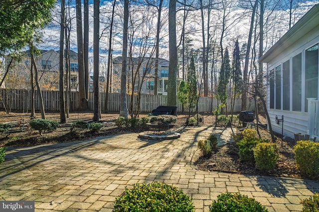 view of patio featuring fence