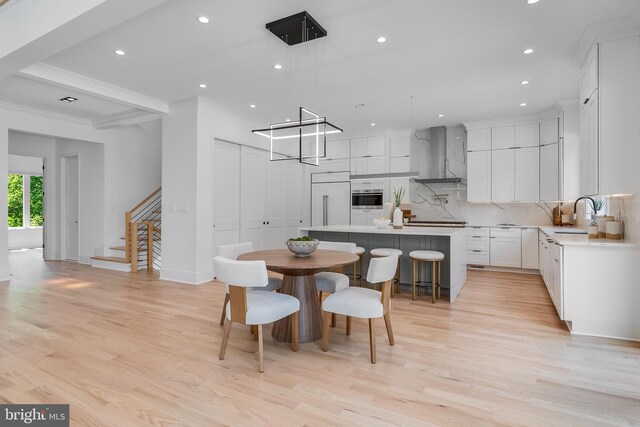 5914 Woodley Rd, Mclean, VA 22101 - dining space with light wood-type flooring, crown molding, stairs, recessed lighting, and baseboards