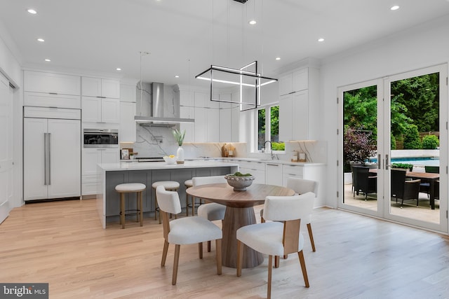 5914 Woodley Rd, Mclean, VA 22101 - dining space with recessed lighting, light wood finished floors, and crown molding