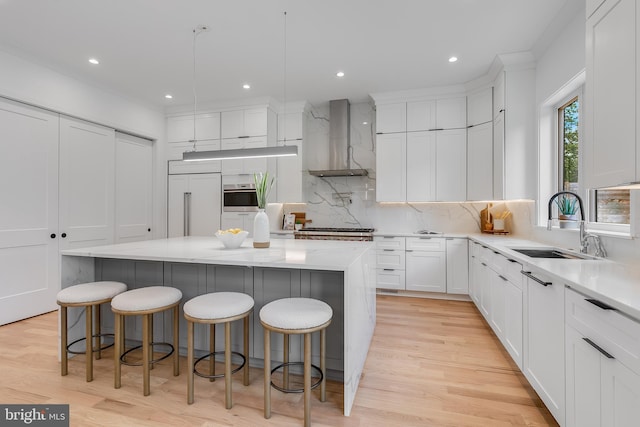 5914 Woodley Rd, Mclean, VA 22101 - kitchen with wall chimney range hood, a sink, paneled built in refrigerator, stainless steel oven, and decorative backsplash