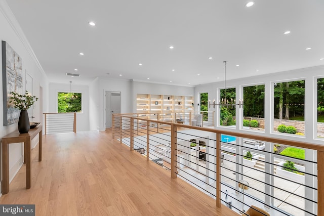 5914 Woodley Rd, Mclean, VA 22101 - corridor featuring an upstairs landing, light wood-style flooring, ornamental molding, and recessed lighting