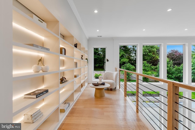 5914 Woodley Rd, Mclean, VA 22101 - corridor with ornamental molding, light wood-style flooring, recessed lighting, and built in shelves
