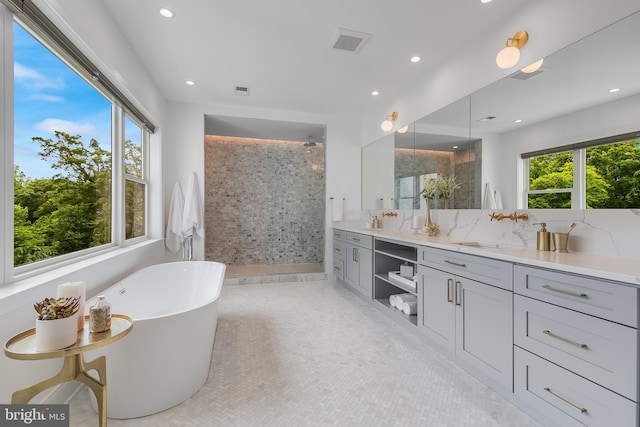 5914 Woodley Rd, Mclean, VA 22101 - full bath with walk in shower, double vanity, a soaking tub, and recessed lighting