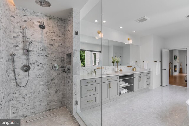 5914 Woodley Rd, Mclean, VA 22101 - bathroom featuring vanity, tiled shower, and recessed lighting