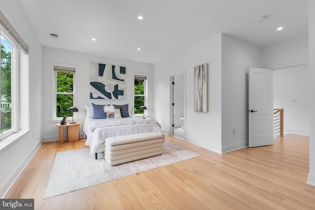 5914 Woodley Rd, Mclean, VA 22101 - bedroom with light wood-type flooring, multiple windows, baseboards, and recessed lighting