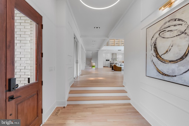 5914 Woodley Rd, Mclean, VA 22101 - entrance foyer featuring light wood-type flooring and stairs