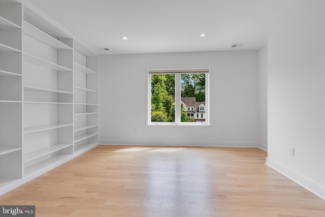 5914 Woodley Rd, Mclean, VA 22101 - spare room with built in shelves, baseboards, light wood-type flooring, and recessed lighting