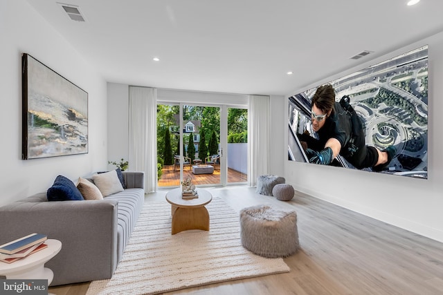 5914 Woodley Rd, Mclean, VA 22101 - living area featuring wood finished floors, recessed lighting, and baseboards