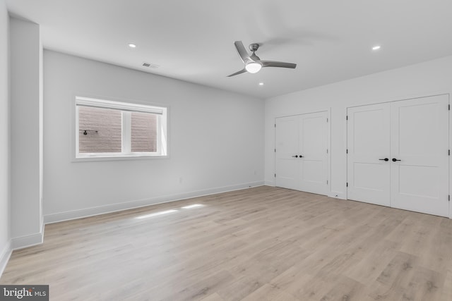 5914 Woodley Rd, Mclean, VA 22101 - unfurnished bedroom featuring multiple closets, light wood-type flooring, baseboards, recessed lighting, and ceiling fan