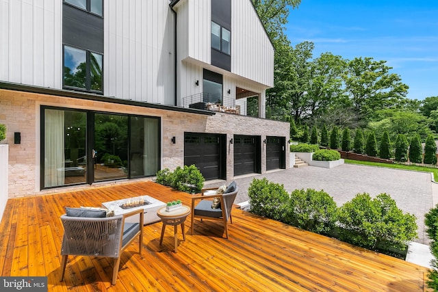 5914 Woodley Rd, Mclean, VA 22101 - deck featuring a garage and outdoor lounge area