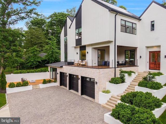 5914 Woodley Rd, Mclean, VA 22101 - view of front of property with stairway, decorative driveway, and a garage