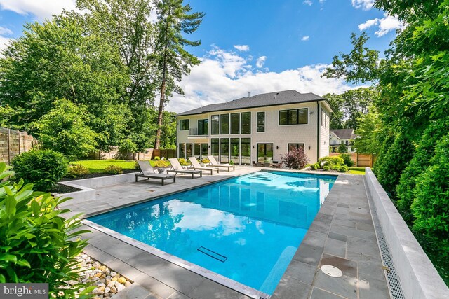 5914 Woodley Rd, Mclean, VA 22101 - view of swimming pool with a patio and a fenced backyard
