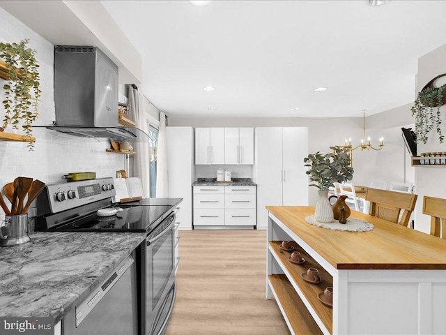 kitchen with open shelves, stainless steel appliances, light wood-style floors, white cabinets, and modern cabinets