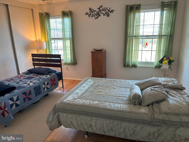 bedroom with wood finished floors