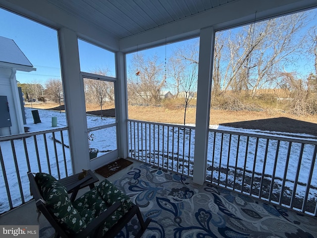 sunroom / solarium with wooden ceiling