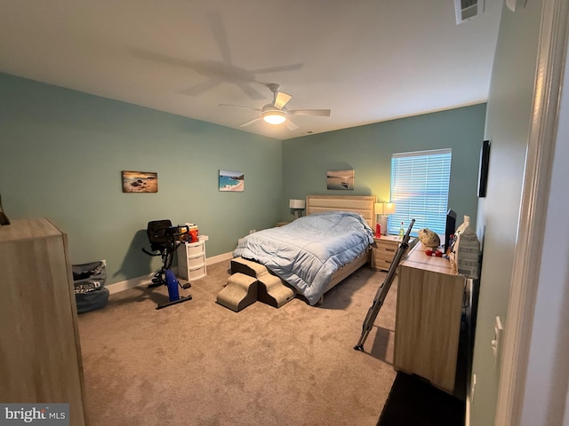 bedroom featuring visible vents, ceiling fan, light carpet, and baseboards