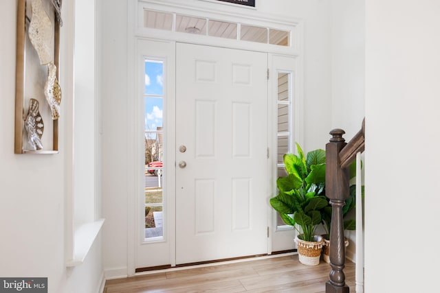 foyer entrance with wood finished floors