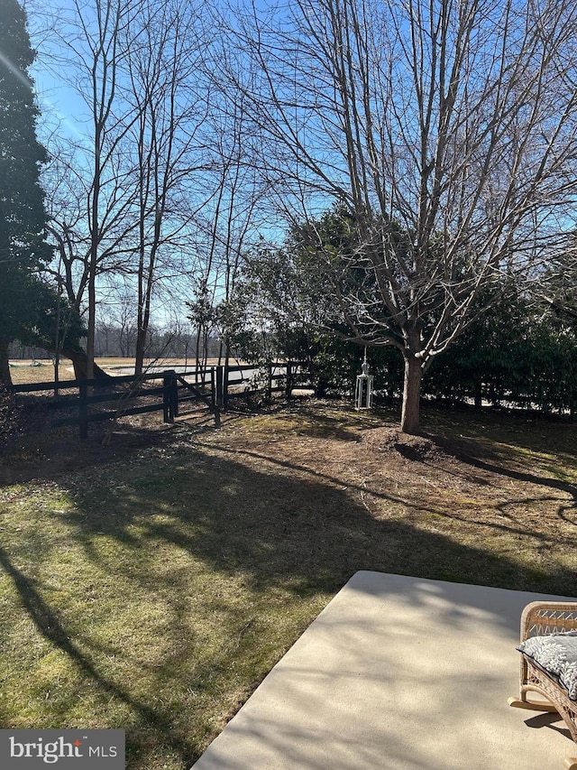 view of yard with a patio area and fence