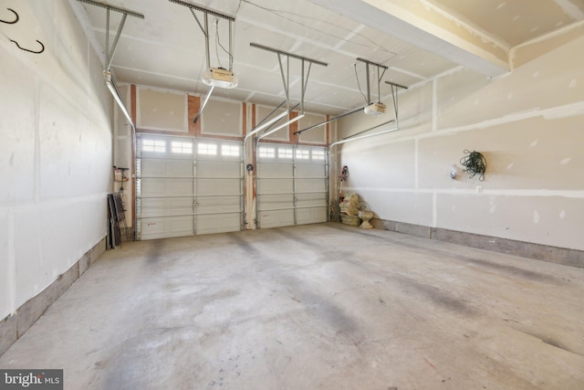 garage featuring a garage door opener