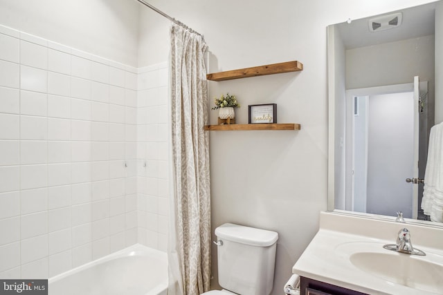 bathroom with toilet, shower / bath combination with curtain, and vanity