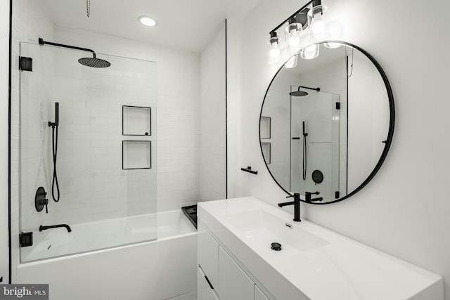 bathroom with recessed lighting, shower / tub combination, and vanity