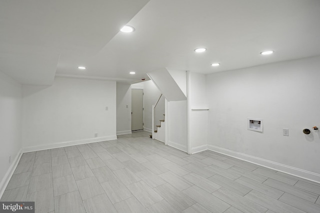 bonus room with baseboards, stairway, and recessed lighting