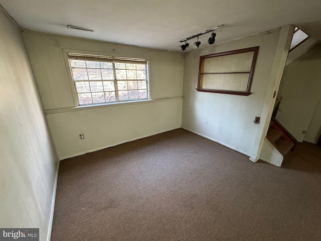 8267 Old Mill Rd, Pasadena, MD 21122 - interior space featuring visible vents, carpet flooring, rail lighting, and baseboards