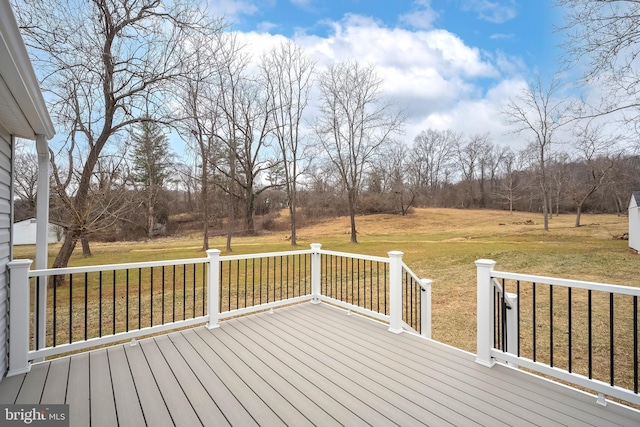 deck featuring a yard