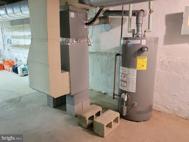 utilities with electric panel, water heater, and heating unit