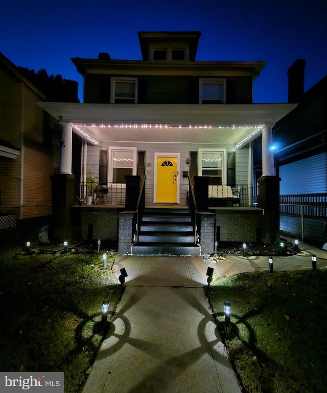 traditional style home with a porch