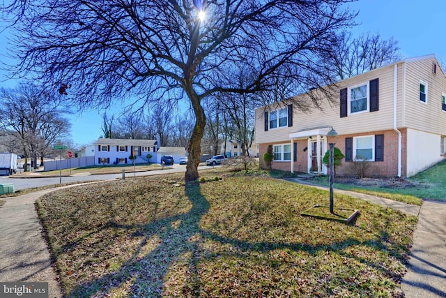 view of front of property featuring brick siding