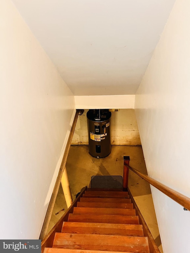 staircase featuring electric water heater